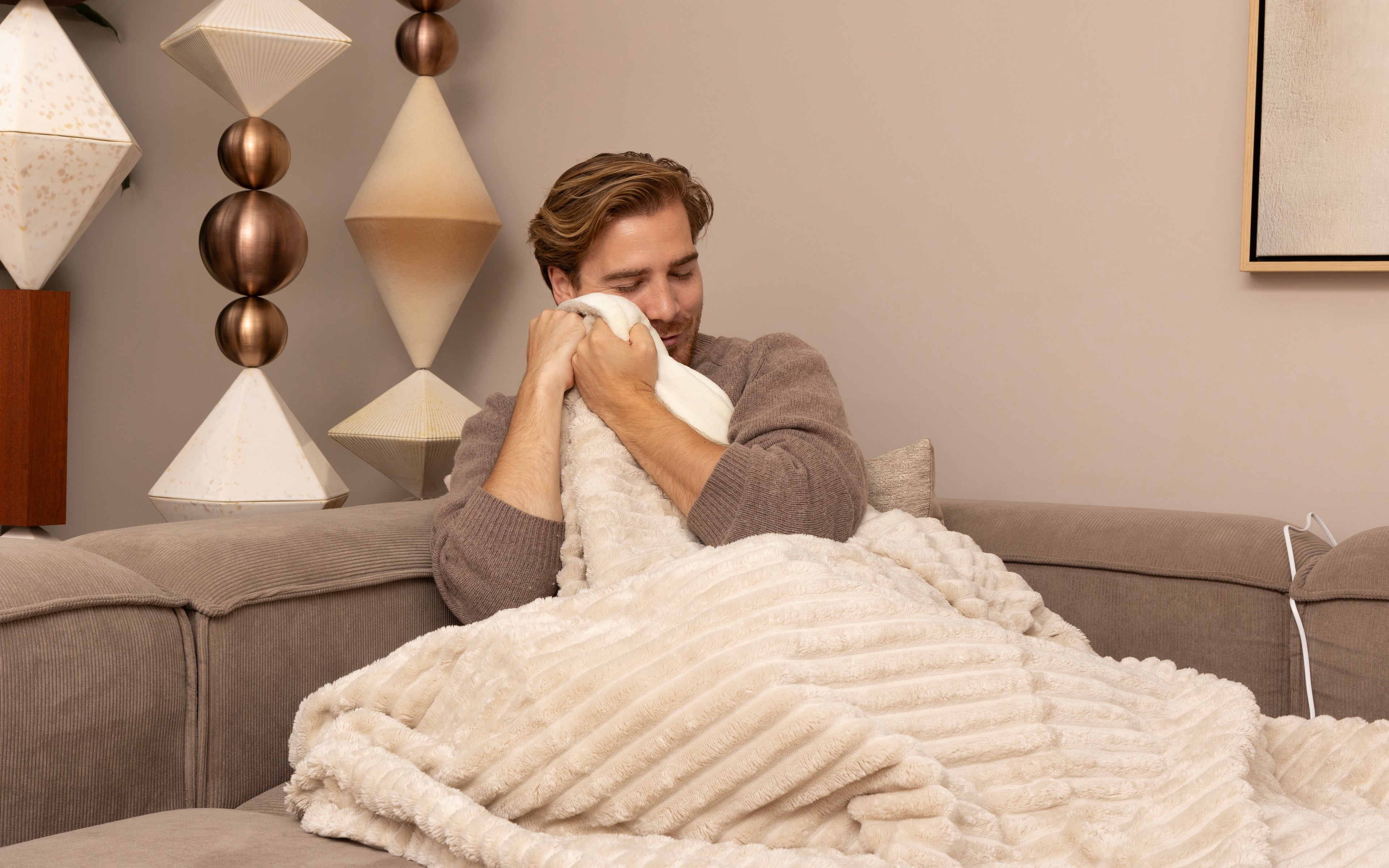Luxe warmtedeken striped voor op de bank