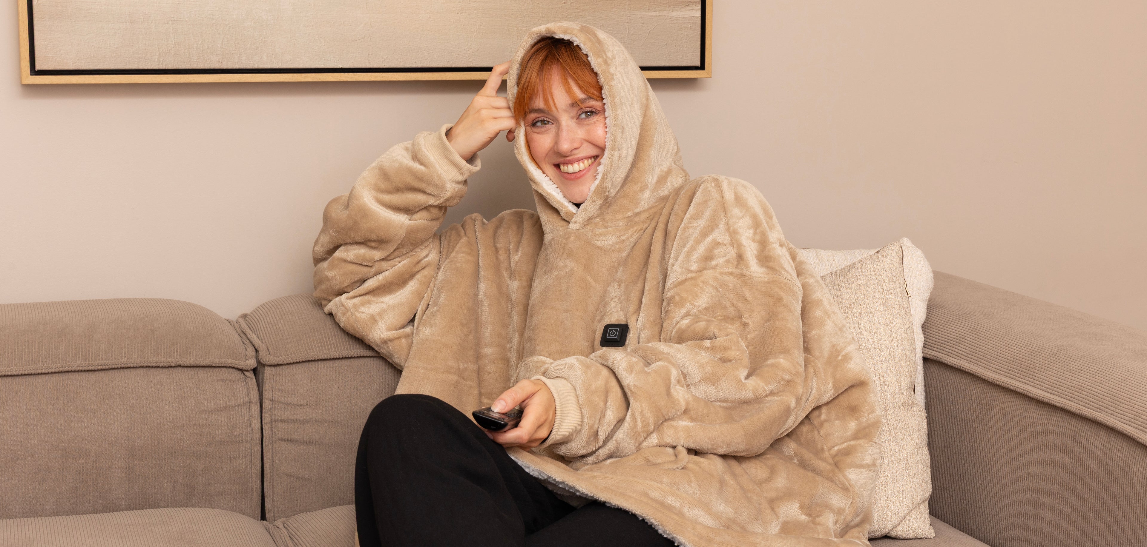 Verwarmde snuggle hoodie voor op de bank