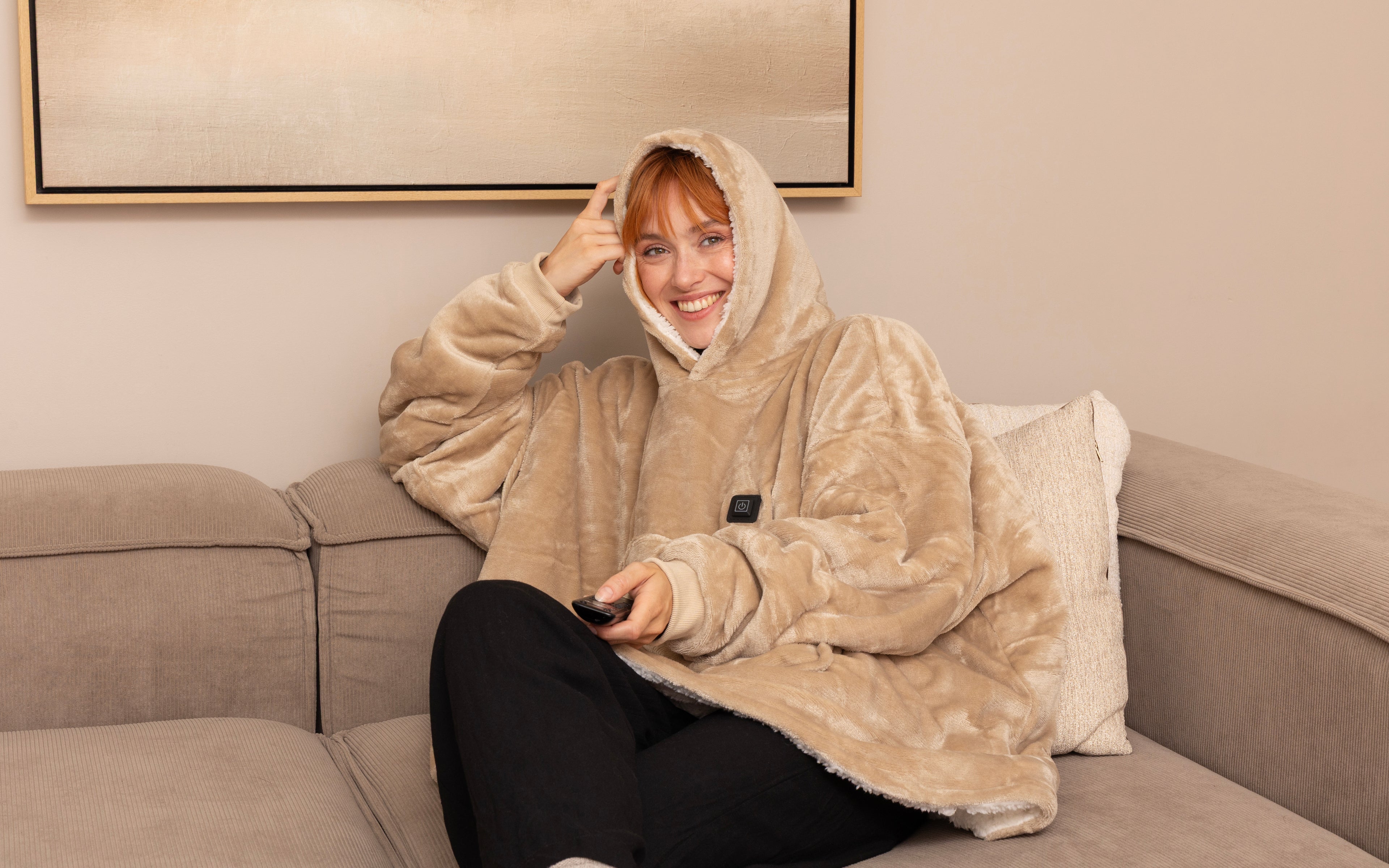Verwarmde snuggle hoodie voor op de bank