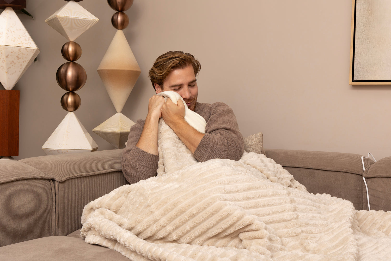 Luxe warmtedeken striped voor op de bank