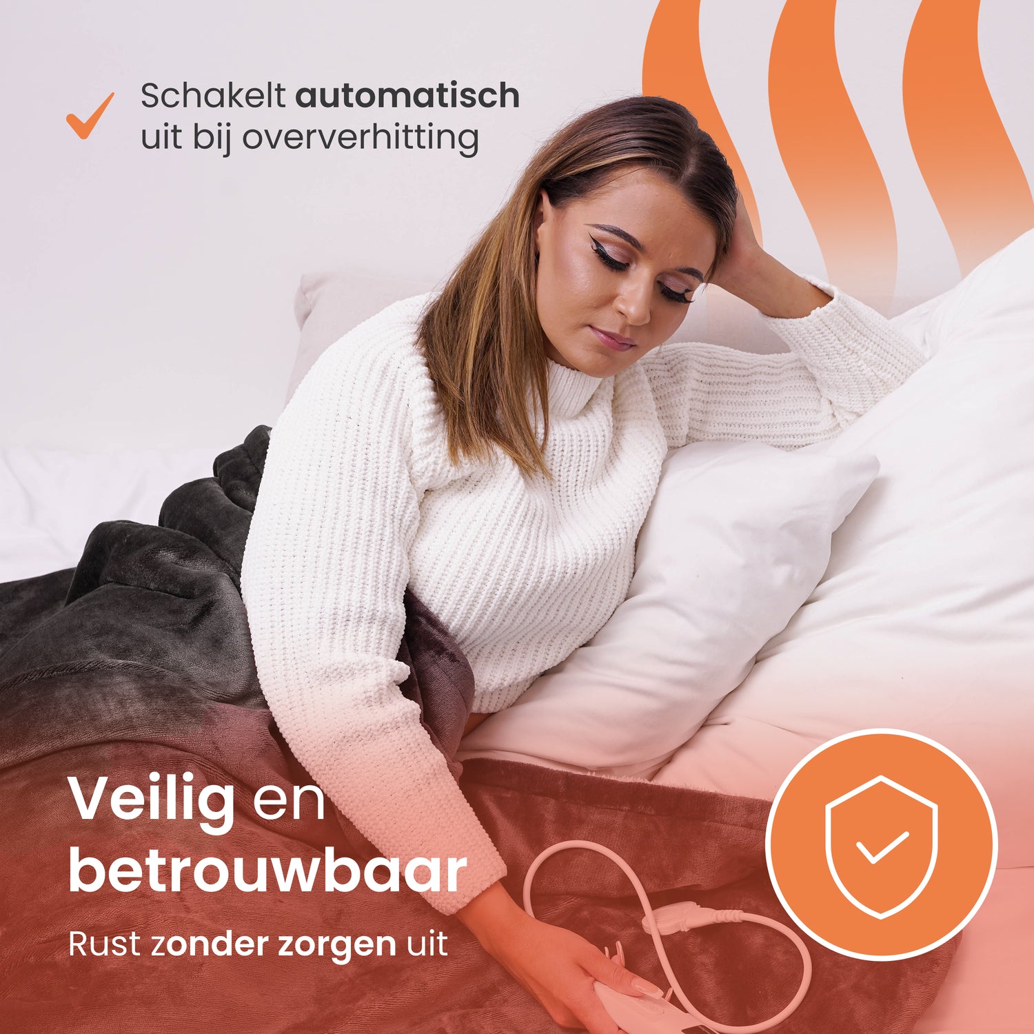 Vrouw ontspannen met veilige elektrische warmtedeken met automatische uitschakeling bij oververhitting.
